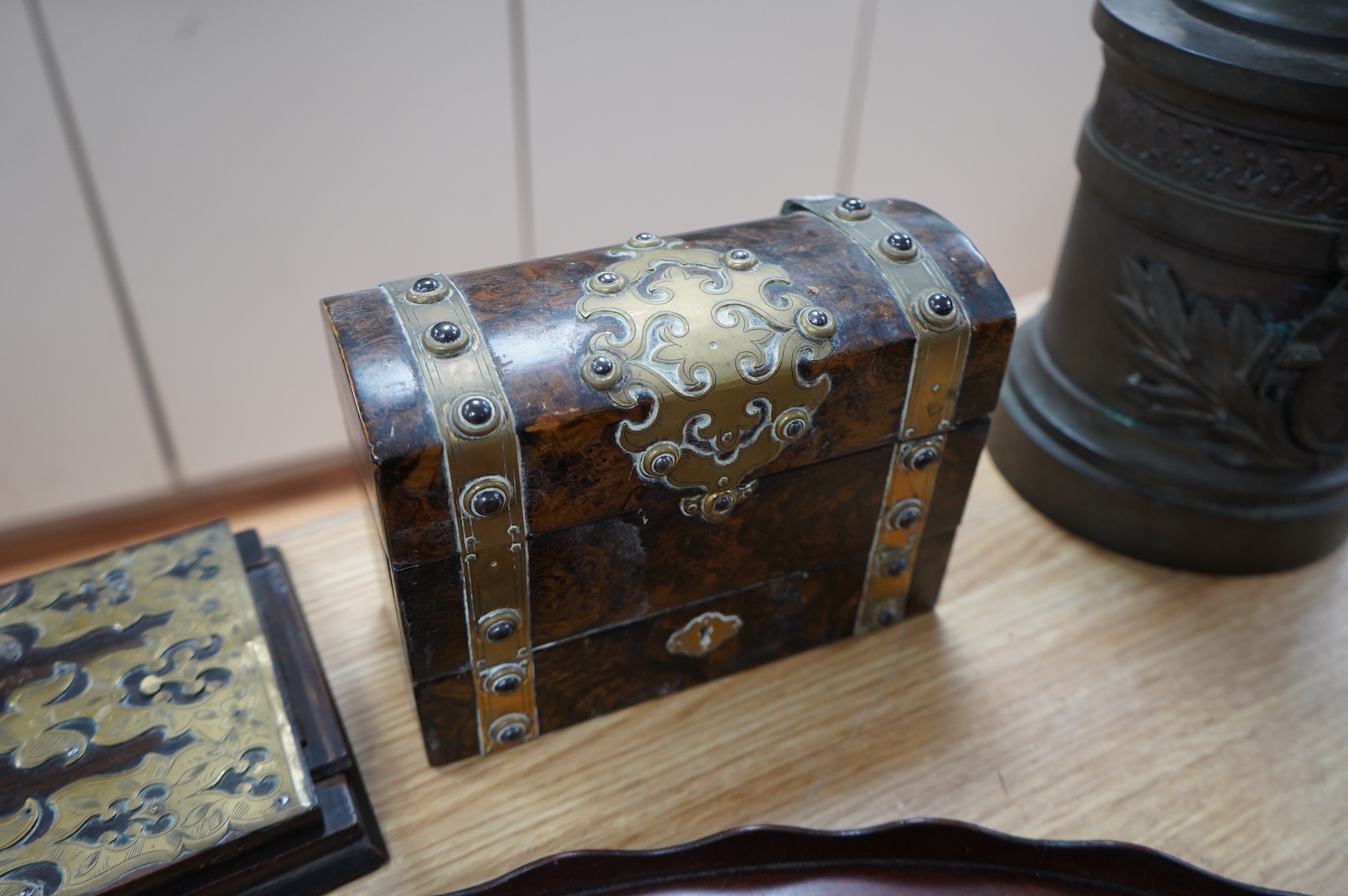 A Victorian domed scent bottle casket, two brass mounted book slides and a marquetry tray, 68cm